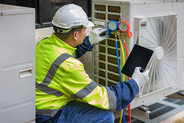 Professional Hvac technician working in Rogersville, AL